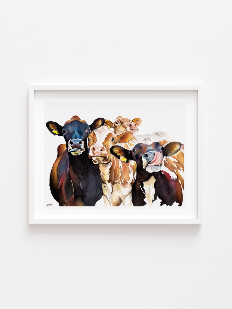 May include: A watercolor painting of four cows with different colored markings. The cows are looking directly at the viewer. The painting is framed in a white frame.