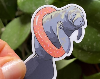 Manatee mit Donut Floatie-Aufkleber: Wasserfester Vinyl-Aufkleber