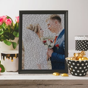 May include: A black framed photo of a wedding couple, with the image made up of tiny black dots. The photo is on a white shelf with a white pitcher, a white mug with gold dripping down the side, a pink rose, and a black and white polka dot bowl filled with gold chocolate candies.