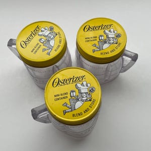 May include: Three yellow plastic containers with lids. The lids have a black and white illustration of a chef and the text "Osterizer Lique-fier Blender Mini-Blend Container Blend and Store".