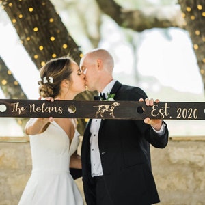 Looking for the perfect wedding gift? Our customized wood shot skis are handmade, engraved, and blowtorched to order. You choose the fonts, wording, and logos/monogram and we take care of the rest!  Get THE BEST wedding day pictures!