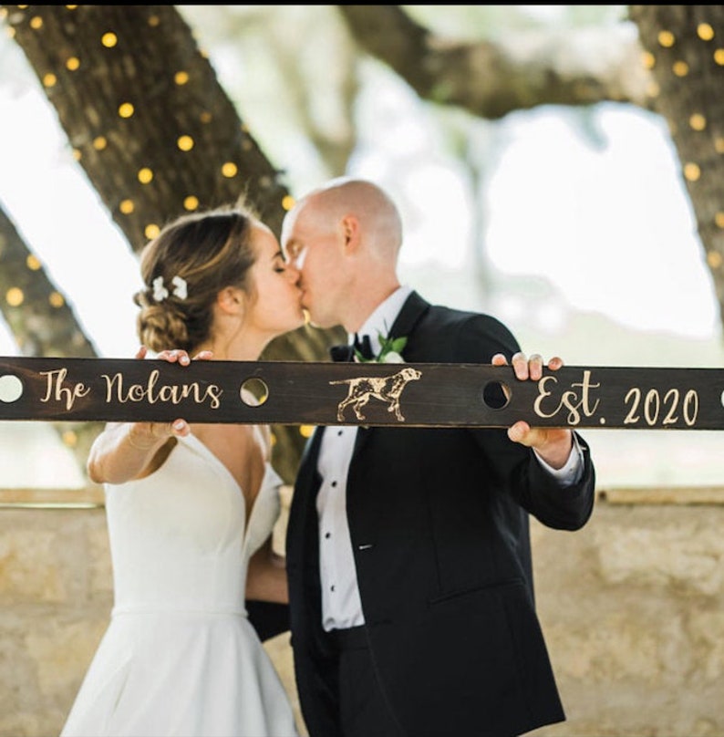 Looking for the perfect wedding gift? Our customized wood shot skis are handmade, engraved, and blowtorched to order. You choose the fonts, wording, and logos/monogram and we take care of the rest!  Get THE BEST wedding day pictures!