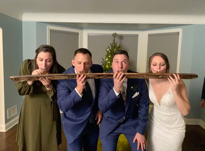 Looking for the perfect wedding gift? Our customized wood shot skis are handmade, engraved, and blowtorched to order. You choose the fonts, wording, and logos/monogram and we take care of the rest!  Get THE BEST wedding day pictures!