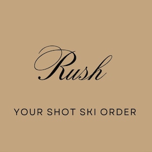 May include: A tan square graphic featuring the black text Rush in a cursive script font positioned above the black text YOUR SHOT SKI ORDER in a simple sans-serif font. The design is centered on a solid tan background with no other elements.