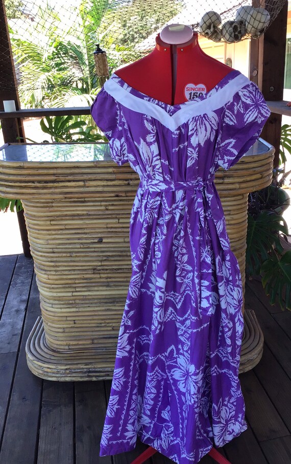 Waltah Clarke’s vintage purple Tiki Hawaiian hoste