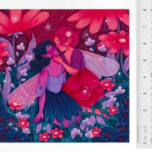 May include: Two fairies with wings, one with pink hair and a red dress, the other with blue hair and a purple dress, are embracing in a field of pink and purple flowers. The background is a dark blue with stars.