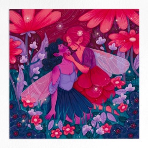 May include: Two fairies with wings, one with pink hair and a red dress, the other with blue hair and a purple dress, are embracing in a field of flowers. The flowers are pink, purple, and blue.