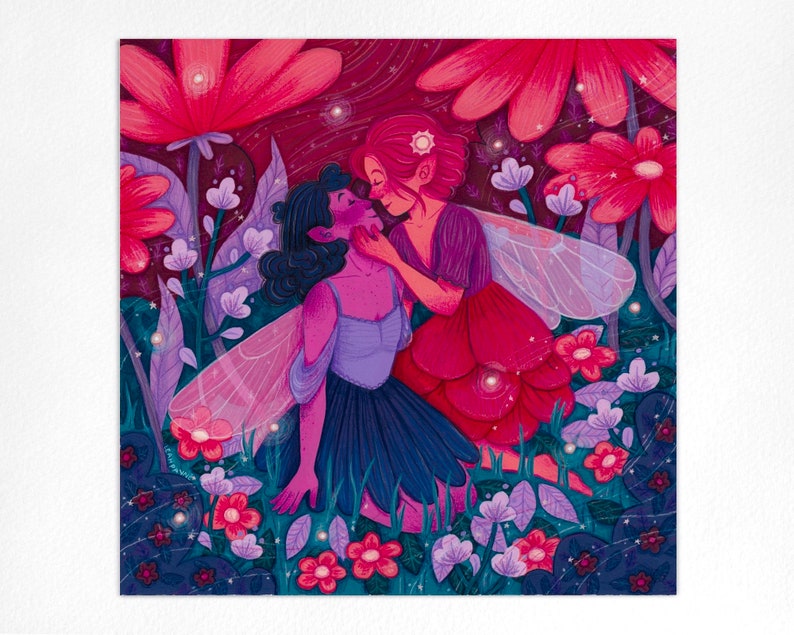 May include: Two fairies with wings, one with pink hair and a red dress, the other with blue hair and a purple dress, are embracing in a field of flowers. The flowers are pink, purple, and blue.