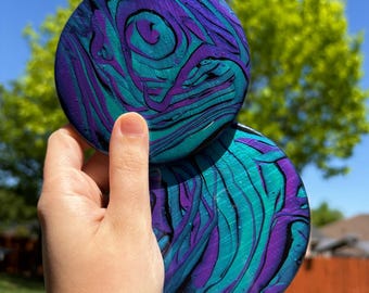 Conjunto de 2 bases para copos que mudam de cor roxa/azul