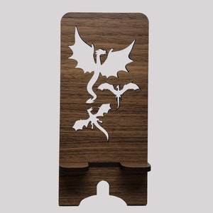 Dragon pierced wood phone holder. Laser cut stand. Silhouettes of 3 Dragons