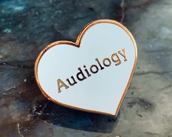 Mintgroene audiologiepin