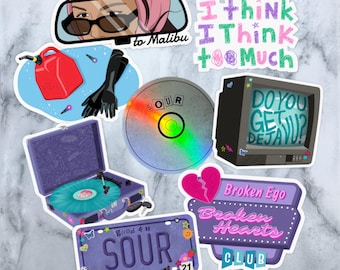 May include: A set of nine colorful stickers featuring various designs, including a record player, a car rearview mirror, a CD, a television, a license plate, and a heart. The stickers have a retro aesthetic and feature phrases like "I think too much", "Do you get Deja Vu?", "Good 4 U", "Sour", and "Broken Hearts Club".
