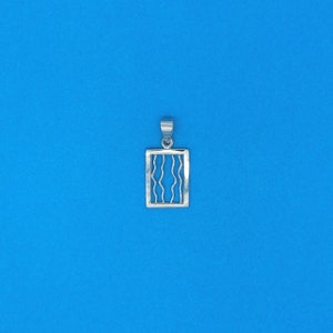 May include: Silver pendant featuring a square frame with a wavy line design.