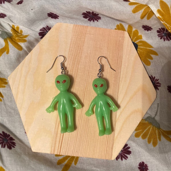 Glow in the dark green alien earrings
