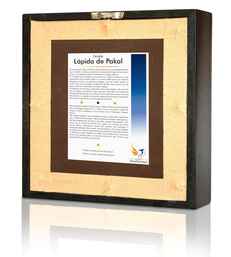 May include: A framed print of a stone inscription in Spanish, titled "L&aacute;pida de Pakal." The inscription describes the tomb of Pakal, a Mayan ruler, and the significance of his death. The print is framed in a dark wood frame with a gold mat.