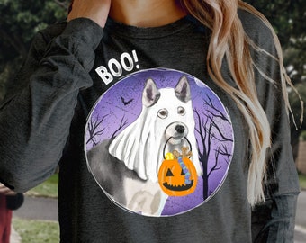May include: A gray long-sleeved sweatshirt with a purple and white graphic of a dog wearing a ghost costume and holding a pumpkin. The text "BOO!" is above the dog.