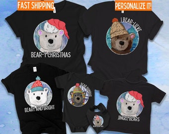 May include: A set of four black t-shirts with different Christmas-themed bear designs. The shirts feature phrases like "Bear-y Christmas", "Beary and Bright", "I Bear-lieve", and "Jingle Bears".