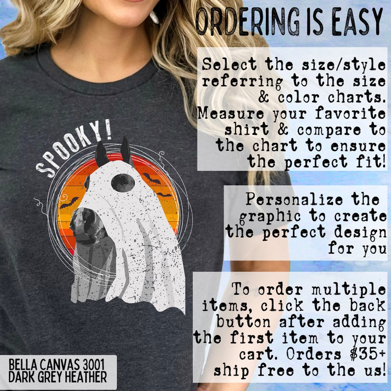 May include: A dark grey heather t-shirt with a spooky horse graphic. The horse is wearing a white ghost costume with a black eye. The text "SPOOKY!" is printed in white on the shirt. The shirt is made by Bella Canvas and is size 3001.