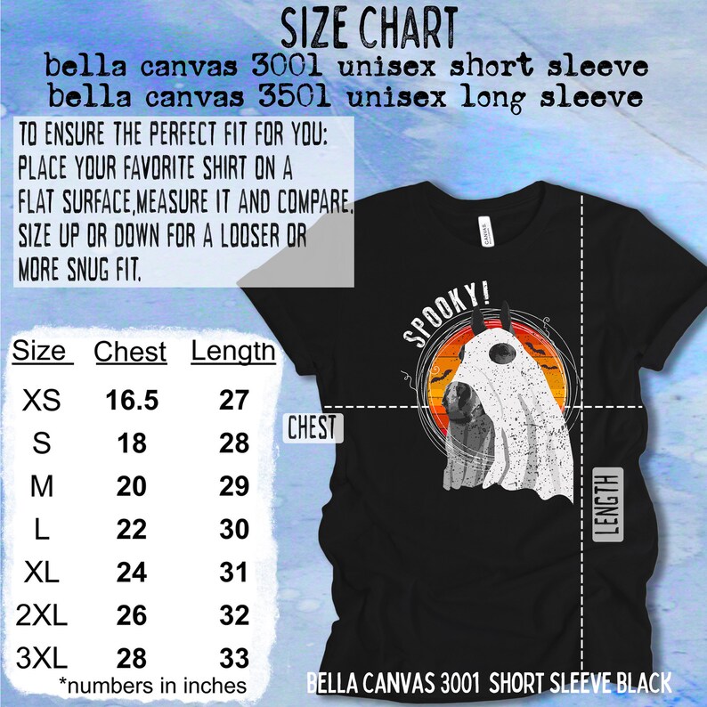 May include: Size chart for Bella Canvas 3001 unisex short sleeve t-shirt. The chart shows chest and length measurements in inches for sizes XS to 3XL. The image also shows a black t-shirt with a ghost graphic and the text "Spooky!" printed on it.