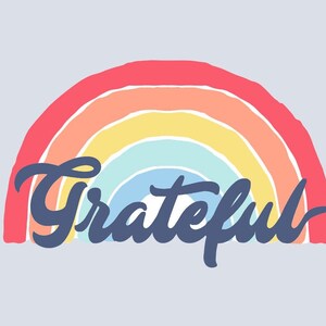 May include: A rainbow-colored arch with the word "Grateful" written in a blue cursive font.