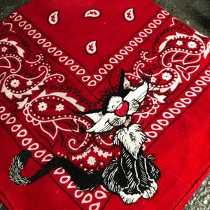 Adorable embroidered cat on a red bandana
