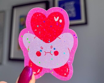 Pegatina impermeable holográfica con purpurina de Kirby Corazón Tonto