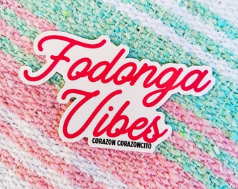 May include: White sticker with red text that says "Fodonga Vibes" and "Corazon Corazoncito" in smaller text below.