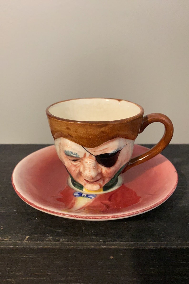 Hand Painted Vintage Cap\u2019n Patch Small Teacup and Saucer