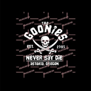 May include: A white graphic design with the text "The Goonies Est. 1985 Never Say Die Astoria, Oregon" with a skull and crossbones in the centre.