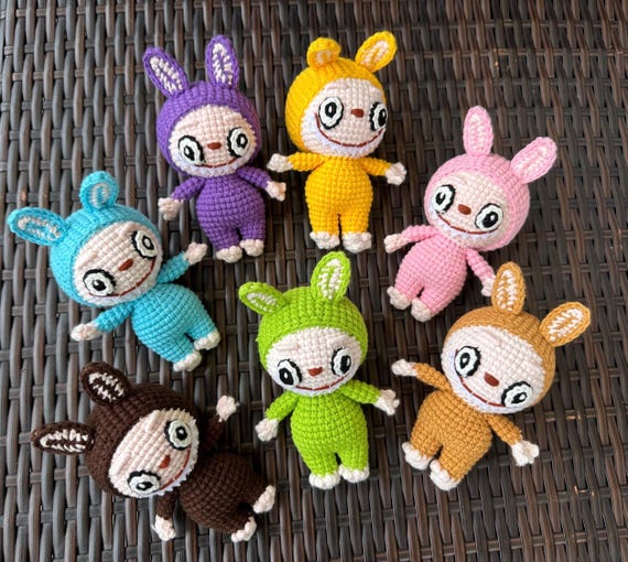 A handmade crochet bunny-monster hybrid that sits in the sweet spot between spooky and adorable — the kind of plushie that makes people do a double-take.