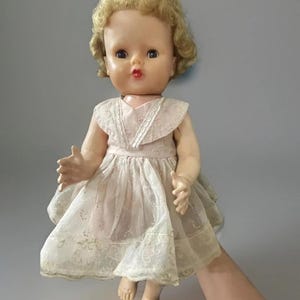 1950s, vintage doll ,hard plastic, sleeping  eyes,dressed ,52cm, walking, voice box doesn’t work