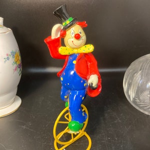 Vintage Porzellan Wandfigur Clown auf dem Fahrrad