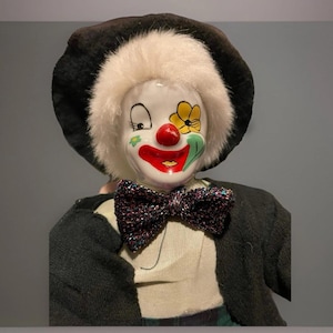 Vintage clown doll with soft body