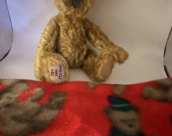 vintage limited edition teddy bear with The Teddy Bear Orphanage badge and fleece blanket