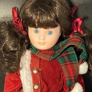 doll girl with soft body in Christmas red Dress