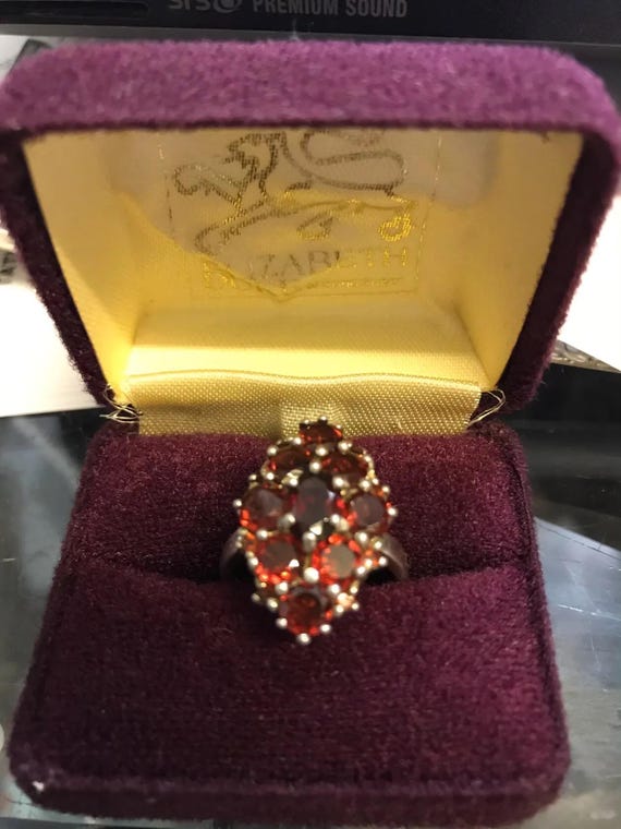 Solid silver garnet set ring.  marked 925, Thaila… - image 1