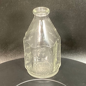 vintage small glass bottle ,Antique clear milk/medicine bottle with measurements ,pharmacy, apothecary, chemist ,made in england