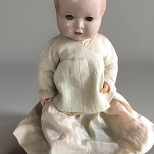 1950s vintage celluloid doll , made Solard, England,sleeping   eyes,dressed  ,large doll