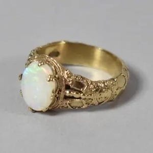 9 ct gold , sintetic  opal  ring, size UK