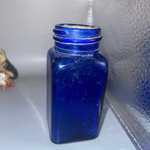 vintage small cobalt blue  glass bottle