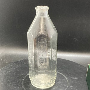 vintage Pyrex brand small glass bottle ,Antique clear milk/medicine bottle with measurements ,pharmacy, apothecary, chemist ,made in england