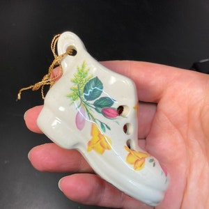 vintage miniature porcelain boot shaped pendant with smelling perfume , marked england ,flowers decoration