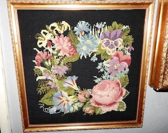 Vintage wool work gilt framed tapestry picture with flowers on black background