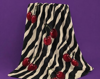 Couverture polaire zèbre cerise | Jeté à imprimé animal audacieux (polyester 315 g/m²)