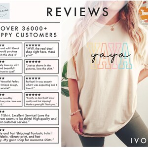 May include: A white t-shirt with the word "yaya" printed in rainbow colors. The shirt is being modeled by a person wearing a pair of olive green shorts. The text "IVORY" is printed in the bottom right corner of the image.