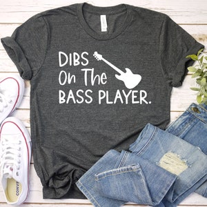 Dibs On The Bass Player - Bassist Shirt, Bass Player, Bass Player Gift, Bass Guitar, Bassist Wife, Bassist Premium Mens Womens Unisex Shirt