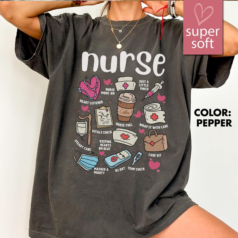 May include: Pepper-colored t-shirt with the word "nurse" in white, featuring medical-themed illustrations like a stethoscope, coffee cup, and syringe. The shirt also includes phrases such as "Nurse Mode On" and "Vitals Check."