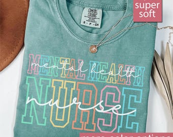 May include: Light green t-shirt with the text "mental health nurse" in rainbow colors. The shirt is super soft and comfortable.