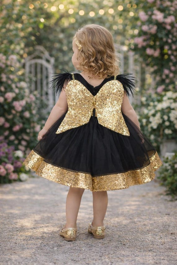 black and gold feather dress Gold Feather Textured Bubble Sleeve Dress in Black She la la