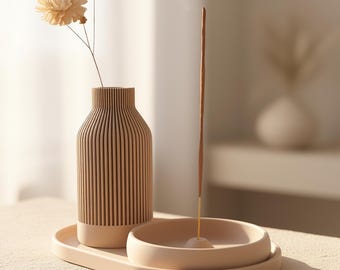Japandi wierookhouderset die as vangt en het stokje loslaat